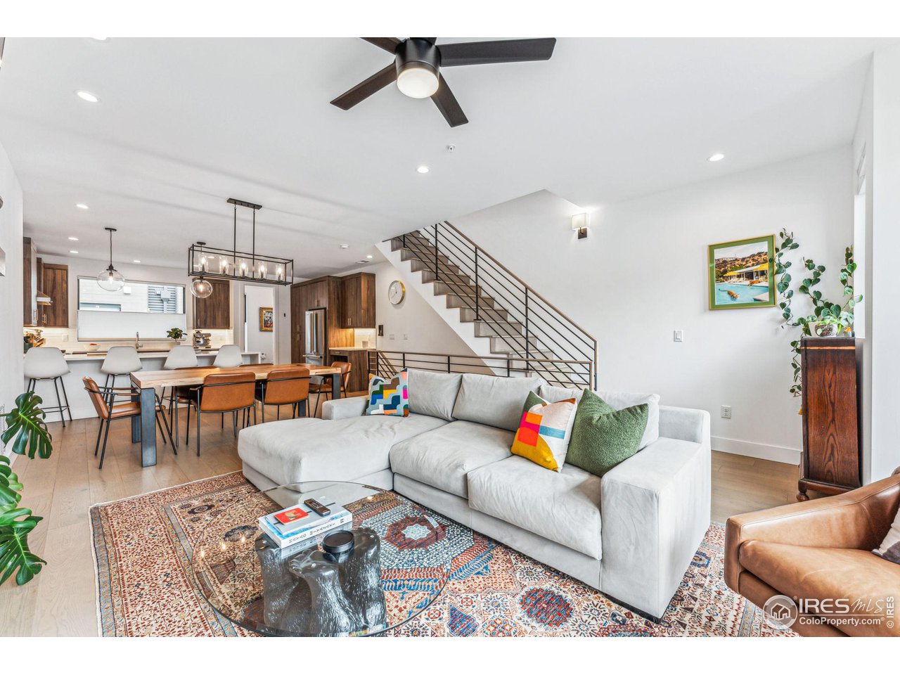2471 Walnut Street Boulder, CO 80302 - Photo 1 of 36 a living room with furniture kitchen view and a chandelier