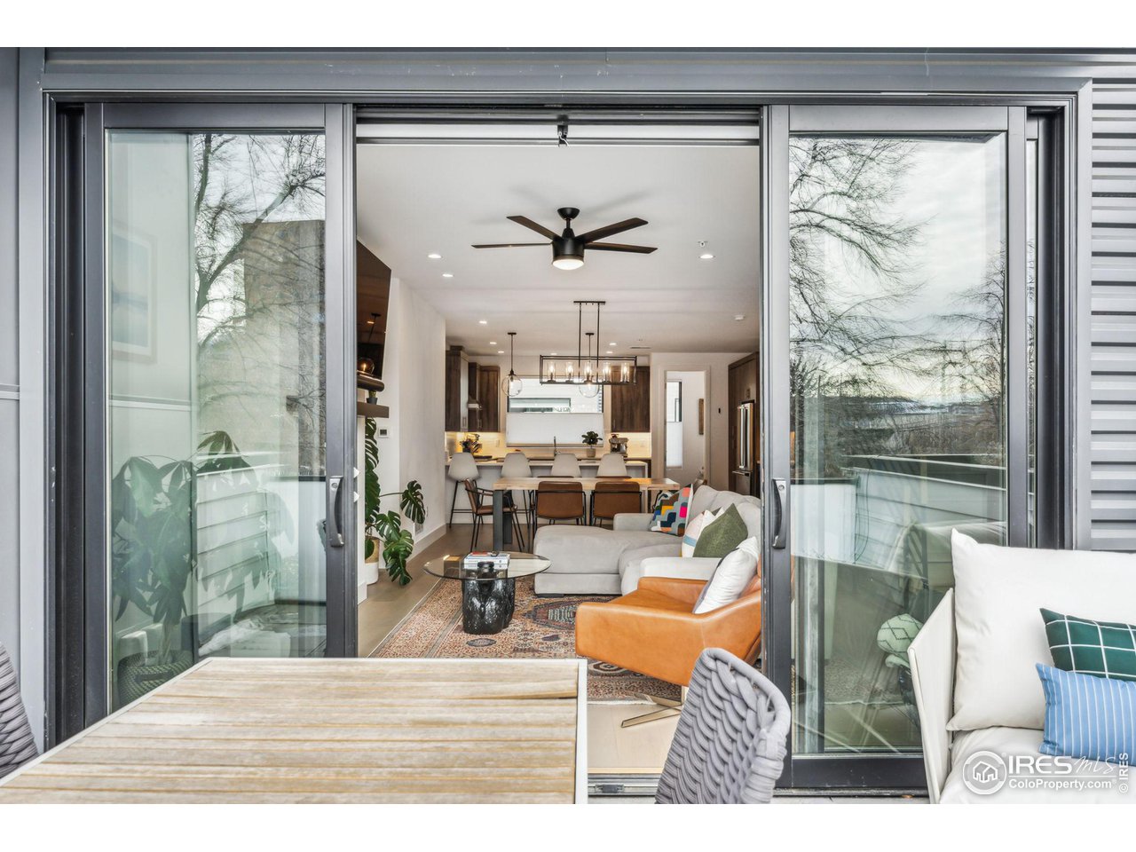 2471 Walnut Street Boulder, CO 80302 - Photo 11 of 36 a living room with patio furniture and a large window