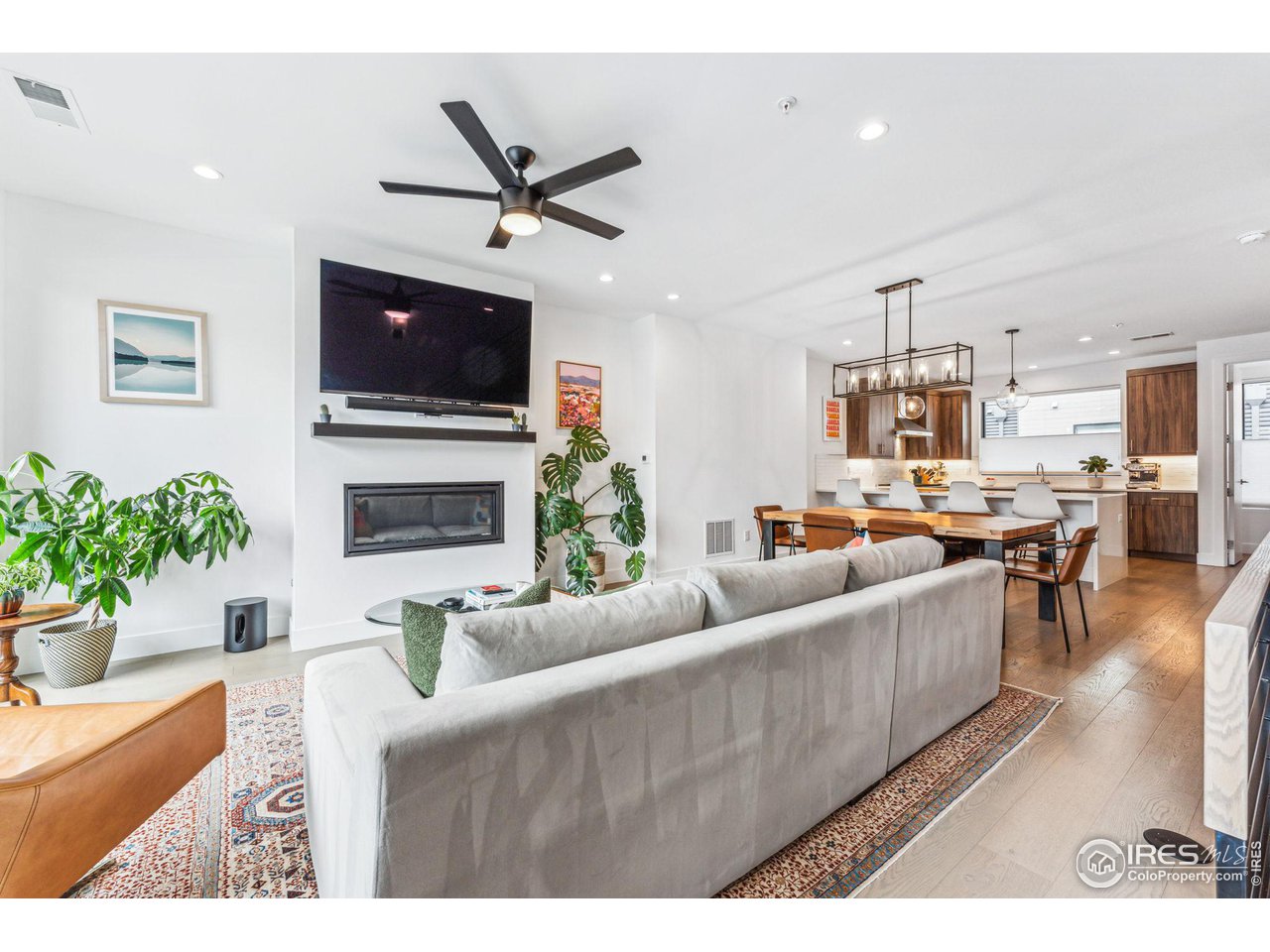 2471 Walnut Street Boulder, CO 80302 - Photo 8 of 36 a living room with furniture and a flat screen tv
