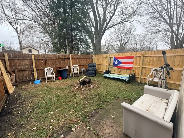 a childrens park with lots of swings and slides