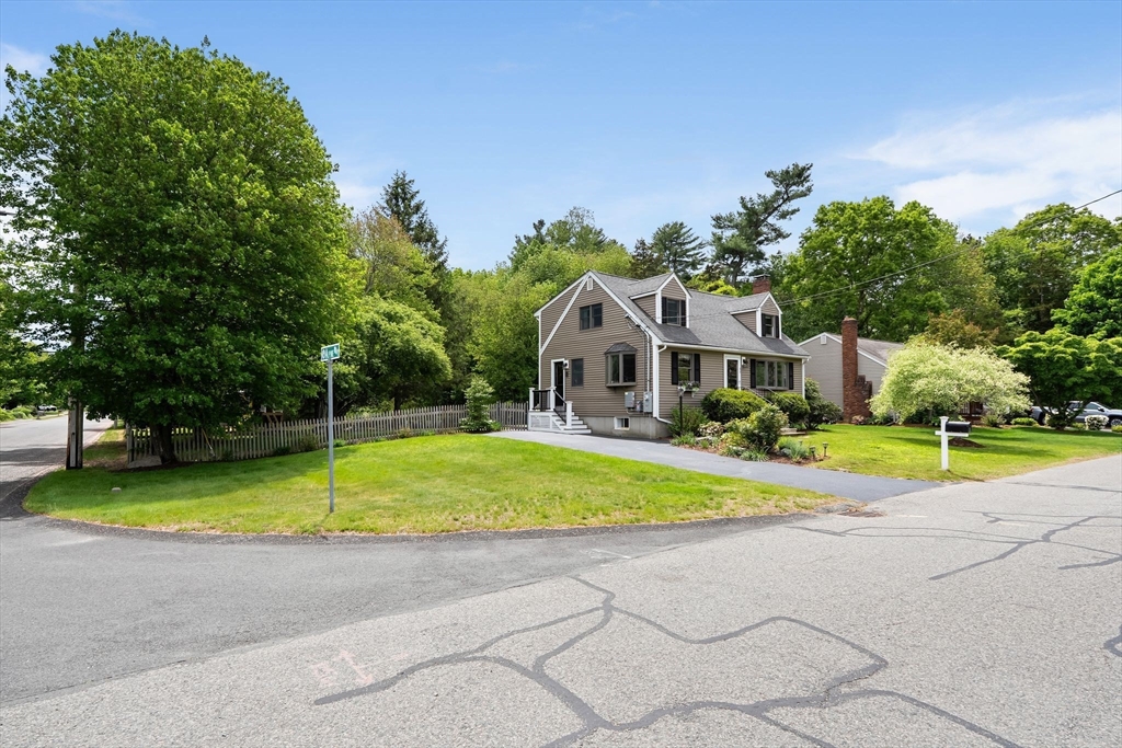 35 Spallus Road Stoughton, MA 02072 - Photo 3 of 39 a house with swimming pool in front of it