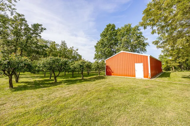 a view of swimming pool with an outdoor space and seating area