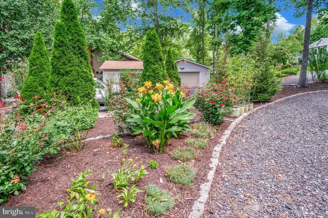 a view of a garden with patio