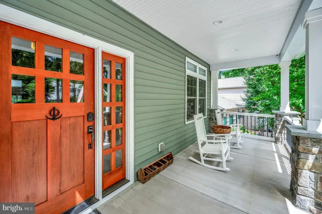 a view of entryway with furniture and rug