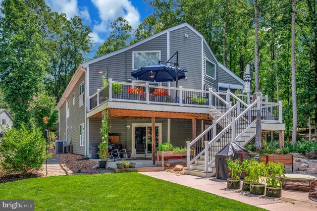 a view of a dining area with furniture and wooden floor