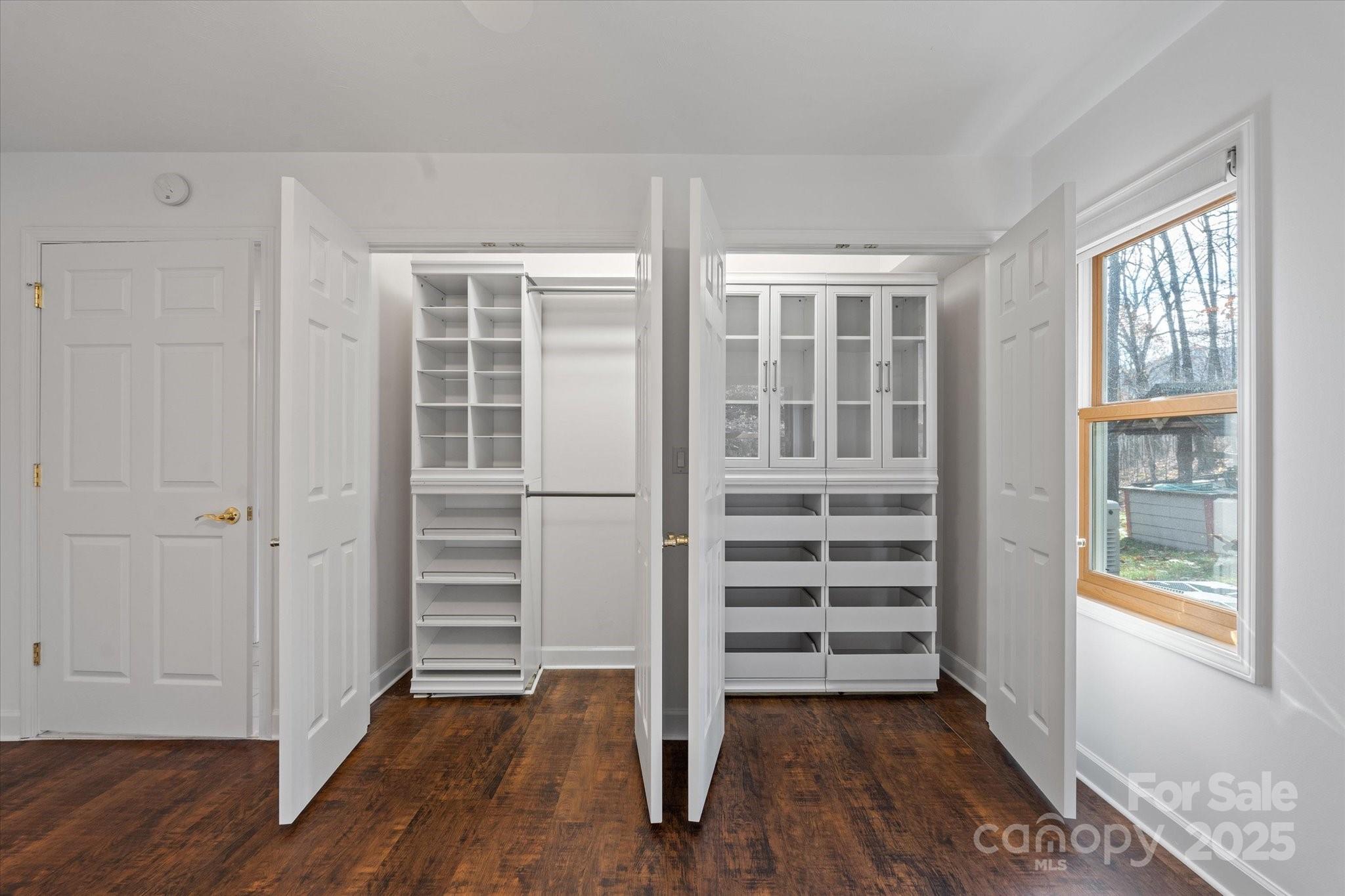 905 Old Fiddle Road Waynesville, NC 28786 - Photo 13 of 39 a view of a room with wooden floor and windows