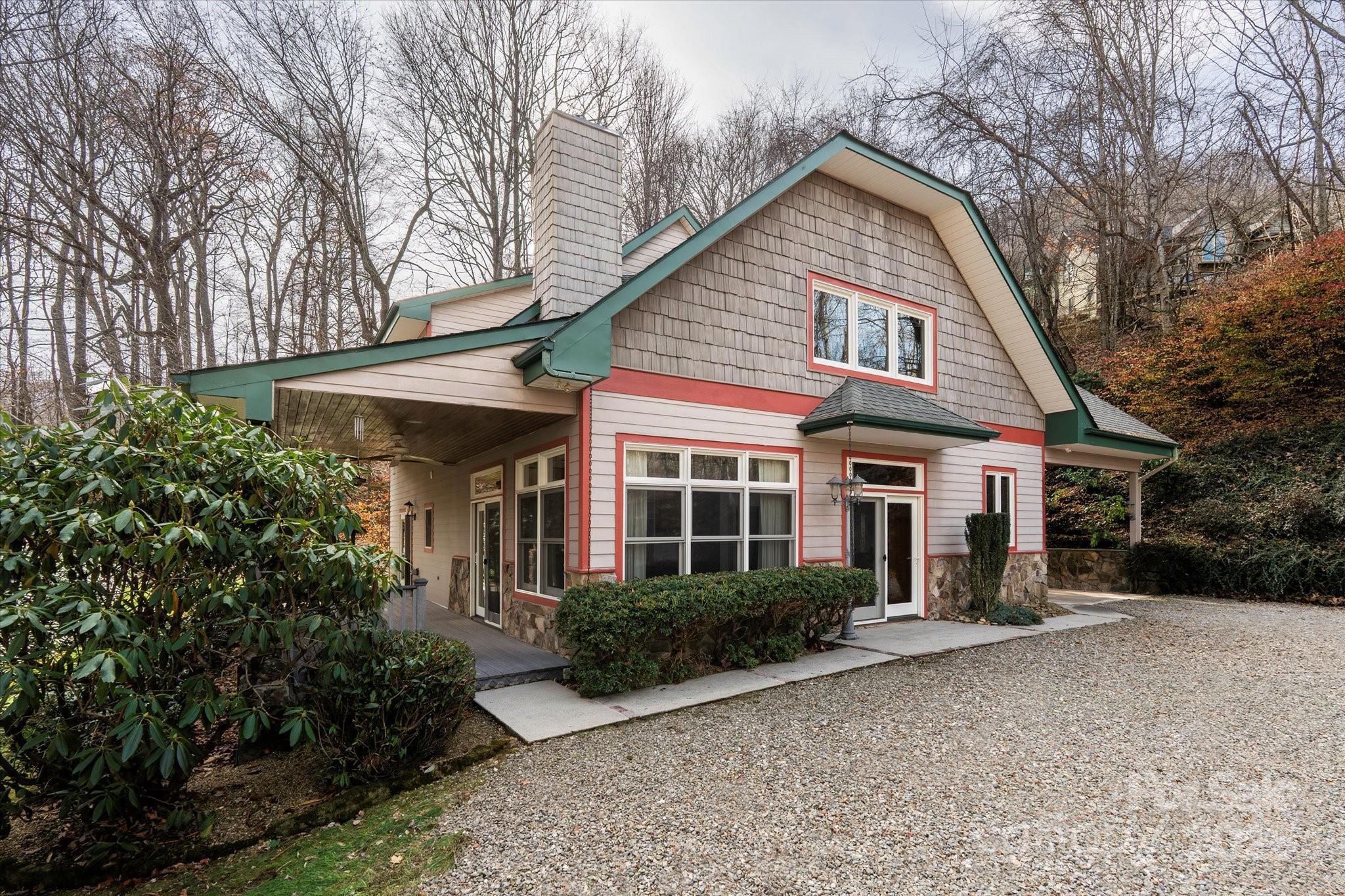 905 Old Fiddle Road Waynesville, NC 28786 - Photo 33 of 39 a front view of a house with garden