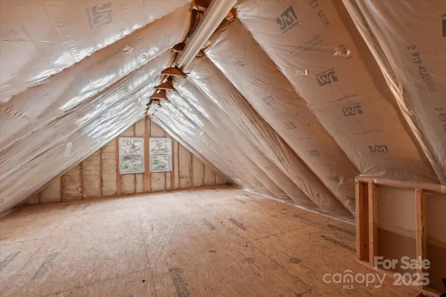 a room with a sink and a mirror