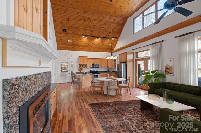 a view of kitchen with furniture and wooden floor