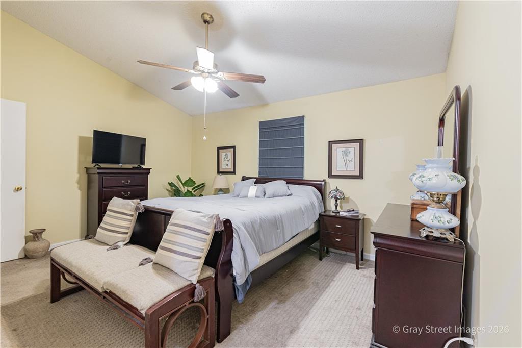 2019 Shields Road, Unit 8 Dalton, GA 30720 - Photo 13 of 17 a bed room with a bed and a television