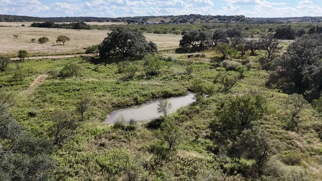 a view of a city with an ocean view