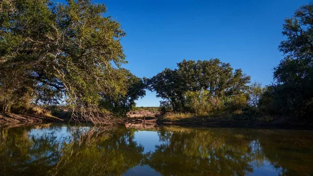 a view of mountain view with mountains in background