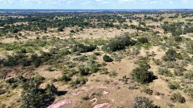 a view of a city with mountains in the background