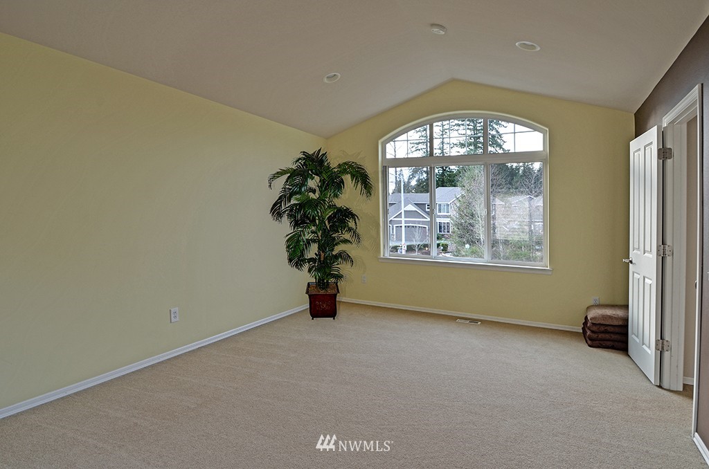 3723 207th Place Southeast Bothell, WA 98021 - Photo 14 of 15 an empty room with windows and entrance