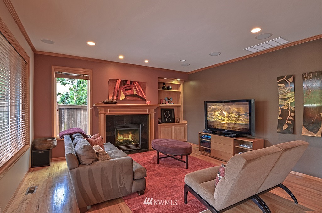 3723 207th Place Southeast Bothell, WA 98021 - Photo 4 of 15 a living room with furniture and a fireplace