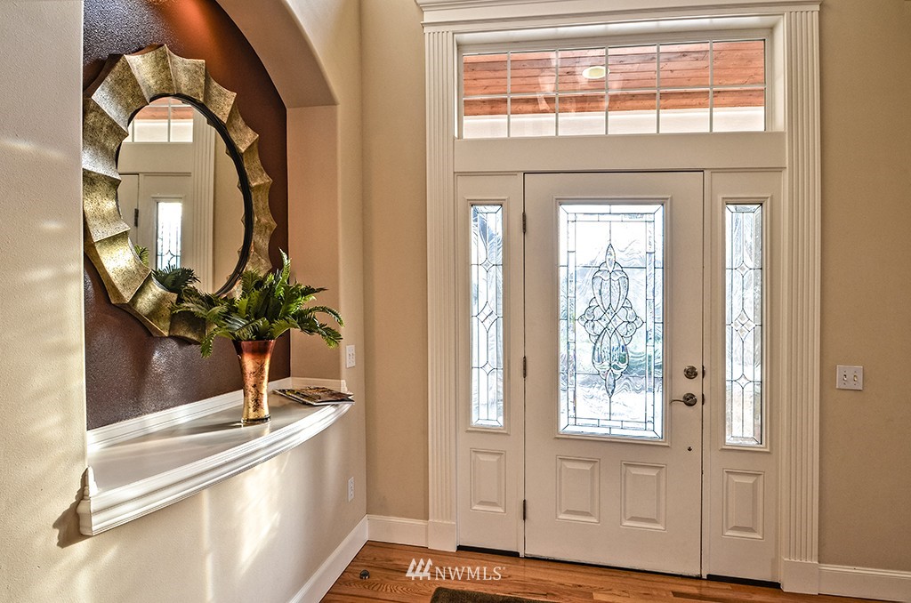 3723 207th Place Southeast Bothell, WA 98021 - Photo 7 of 15 a view of front door with a mirror
