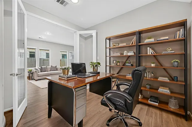a kitchen with stainless steel appliances a stove and a refrigerator