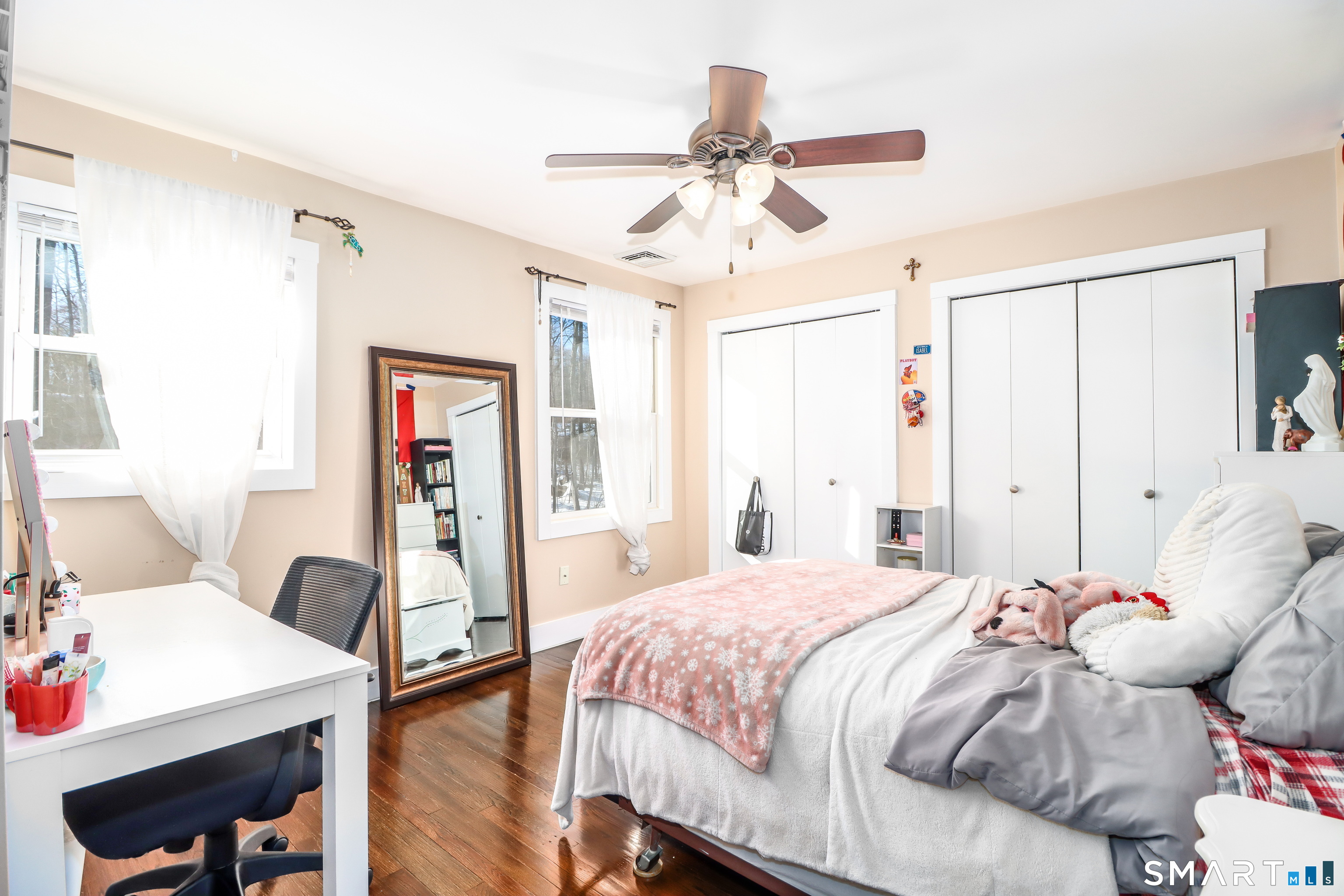 8 Marilyn Road Brookfield, CT 06804 - Photo 13 of 37 a bedroom with a bed and a chandelier