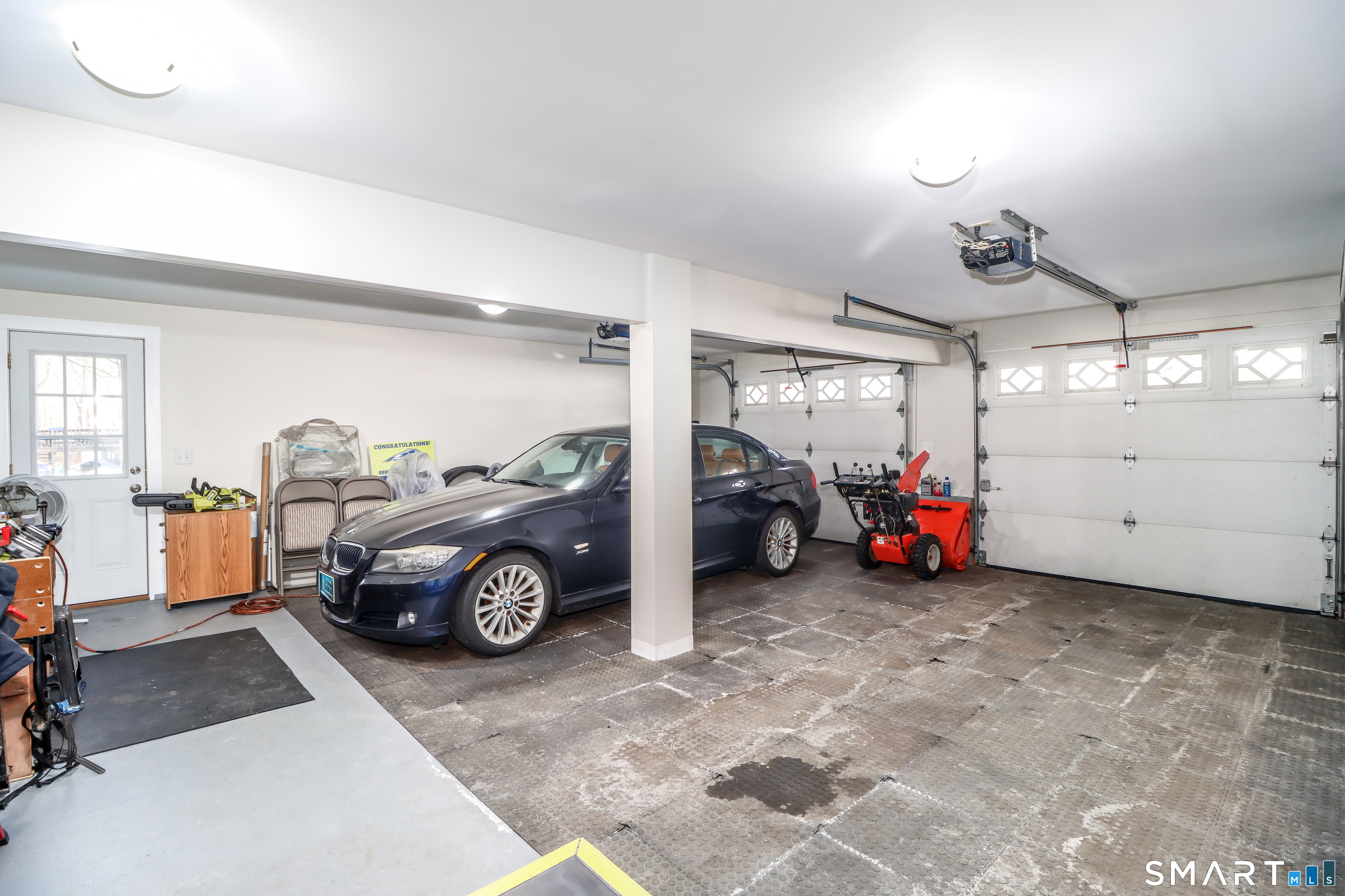 8 Marilyn Road Brookfield, CT 06804 - Photo 26 of 37 a car parked in a garage