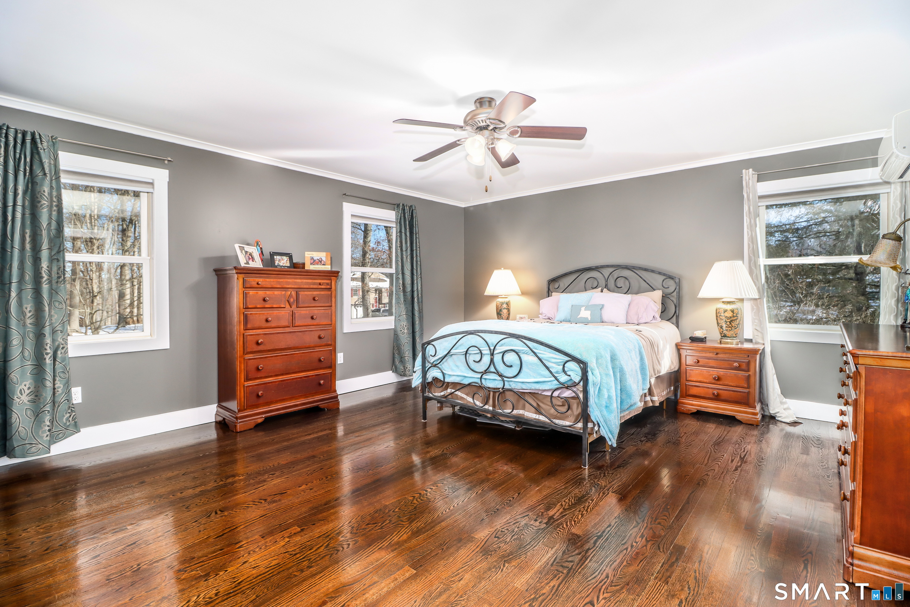 8 Marilyn Road Brookfield, CT 06804 - Photo 34 of 37 a bedroom with a bed and wooden floor