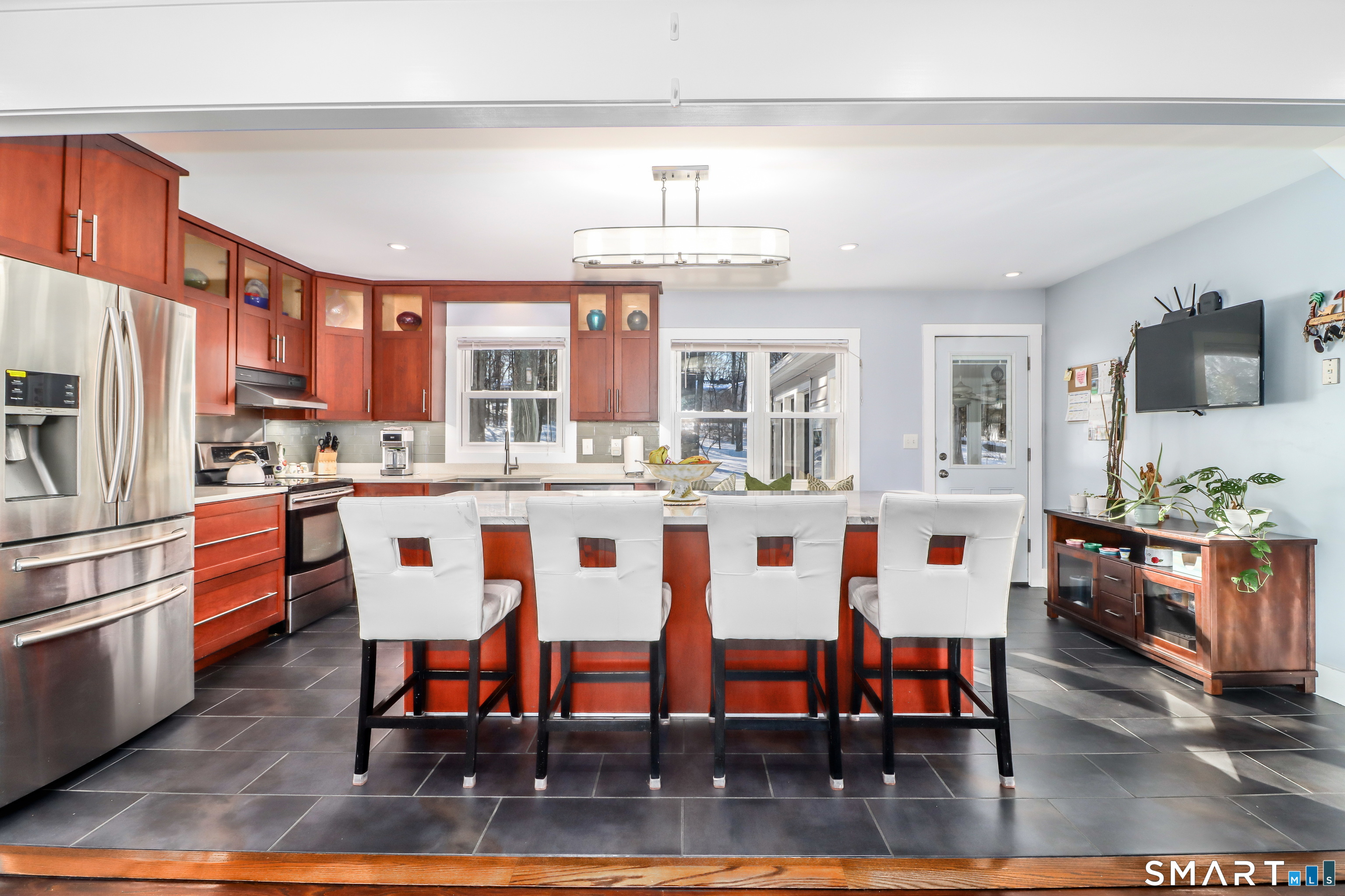 8 Marilyn Road Brookfield, CT 06804 - Photo 4 of 37 a large kitchen with a table and chairs