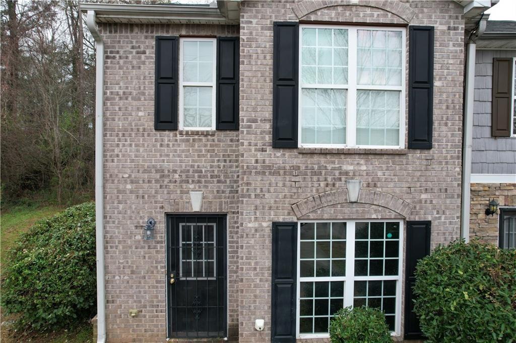 4031 Browne Court Conley, GA 30288 - Photo 1 of 1 a brick house with a large windows