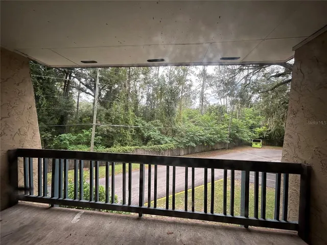 a view of a street from a balcony