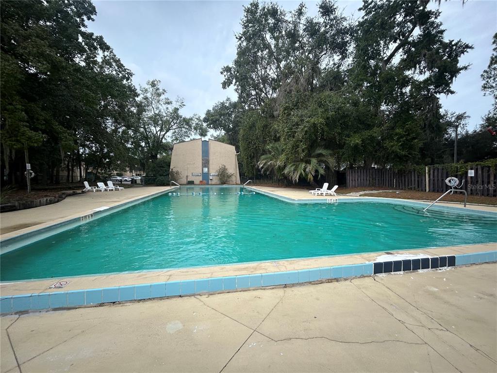 2811 Southwest Archer Road, Unit M106 Gainesville, FL 32608 - Photo 23 of 26 a view of a playground with basketball court