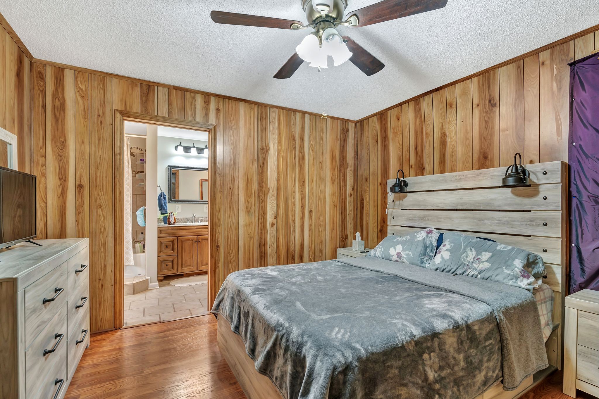 242 Union Ridge Road Wartrace, TN 37183 - Photo 18 of 33 a bedroom with a bed and a mirror