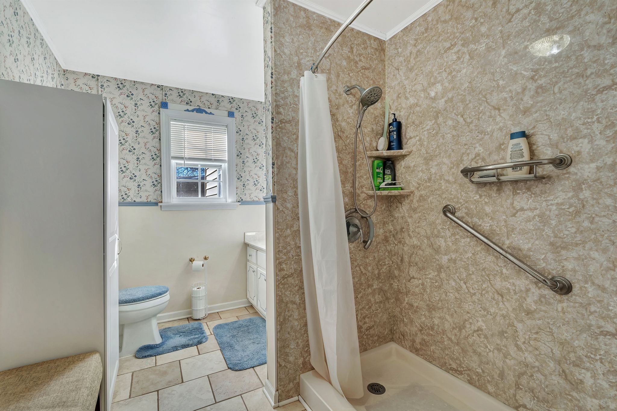 242 Union Ridge Road Wartrace, TN 37183 - Photo 24 of 33 a bathroom with a granite countertop sink a toilet and a shower