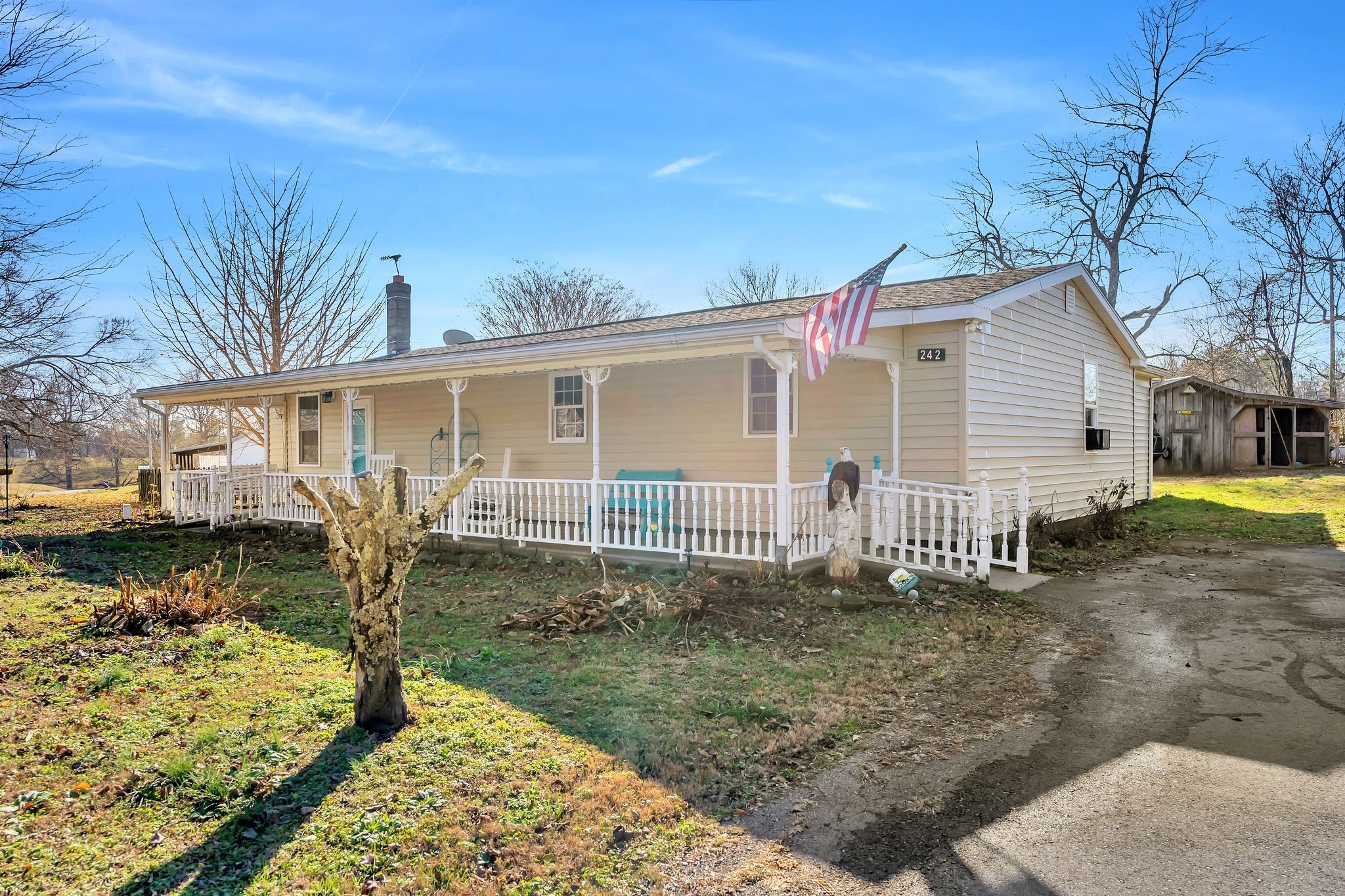 242 Union Ridge Road Wartrace, TN 37183 - Photo 4 of 33 a front view of a house with garden