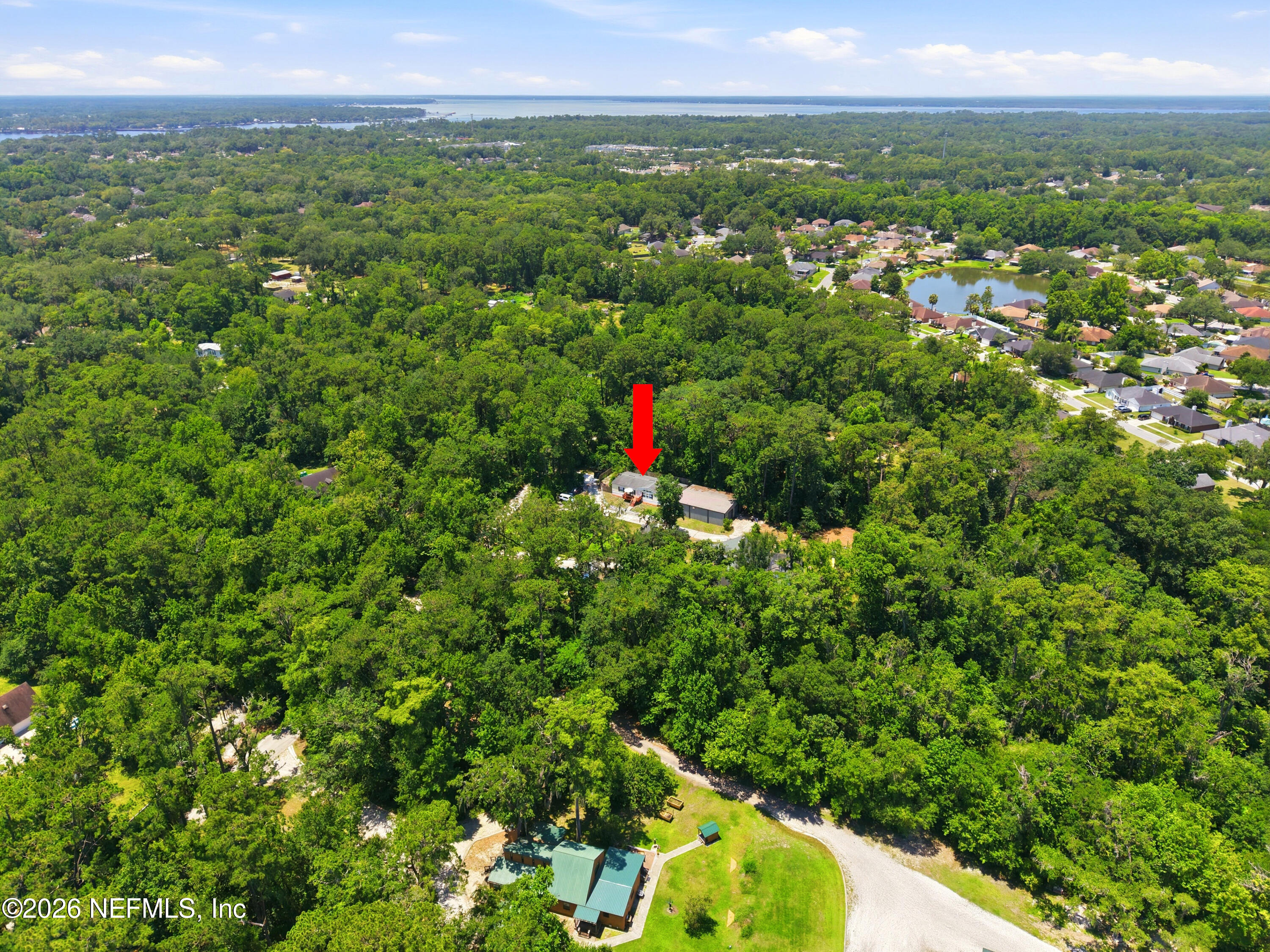 11920 Acosta Road Jacksonville, FL 32223 - Photo 2 of 47 The Real Estateographers_053_Red Arrow