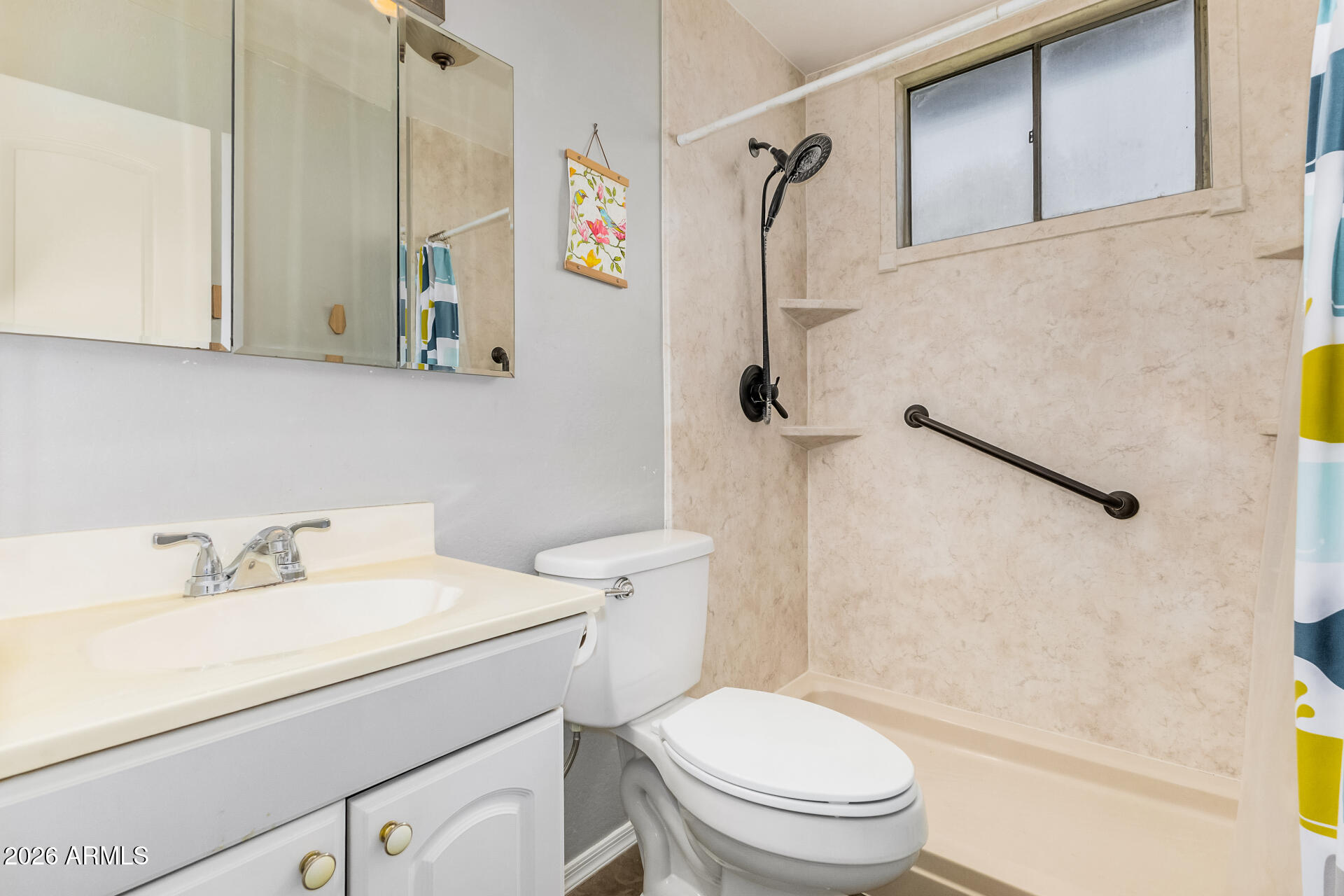 4232 North 10th Street Phoenix, AZ 85014 - Photo 14 of 21 a bathroom with a sink a toilet and shower