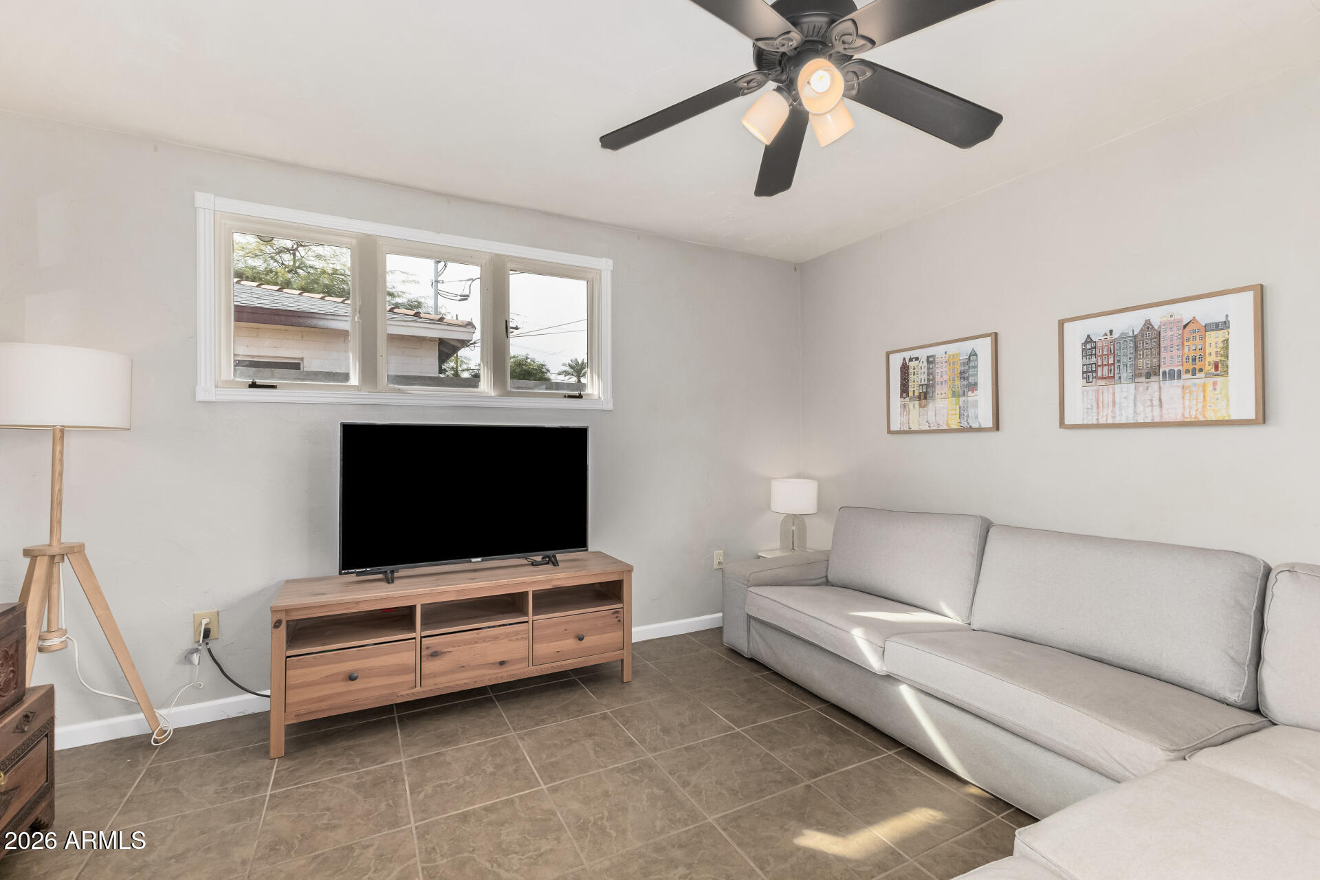 4232 North 10th Street Phoenix, AZ 85014 - Photo 15 of 21 a living room with furniture and a flat screen tv