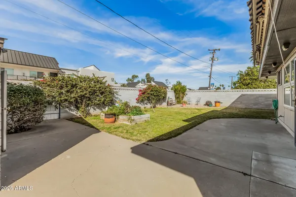 a view of a back yard of the house