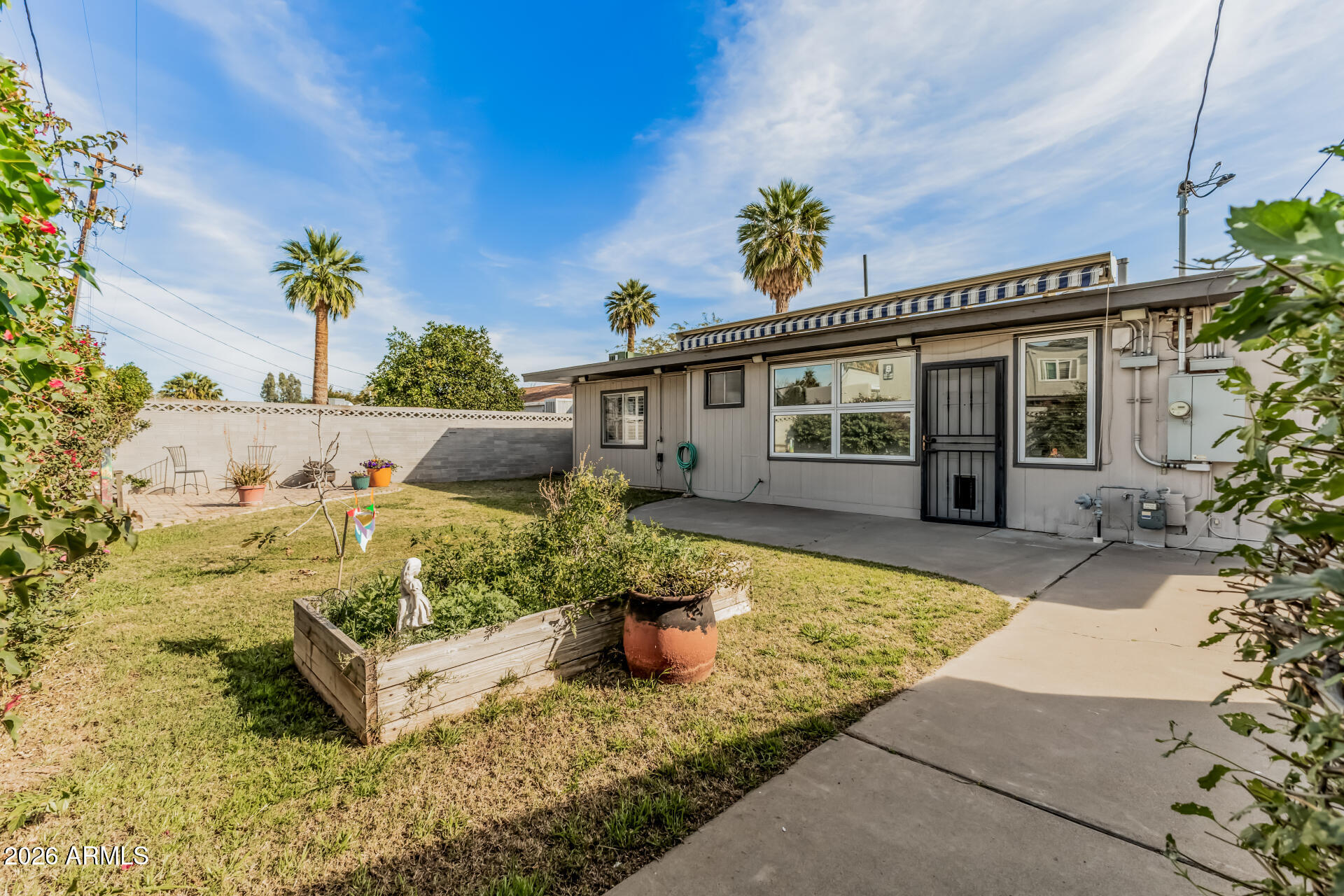 4232 North 10th Street Phoenix, AZ 85014 - Photo 20 of 21 a front view of a house with a yard