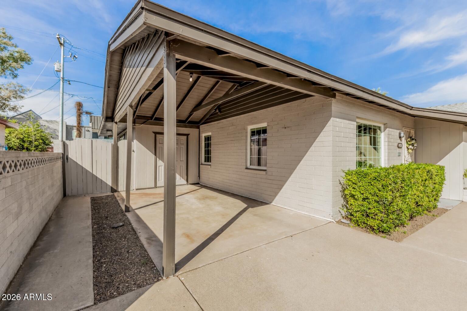 4232 North 10th Street Phoenix, AZ 85014 - Photo 3 of 21 a front view of a house with garden