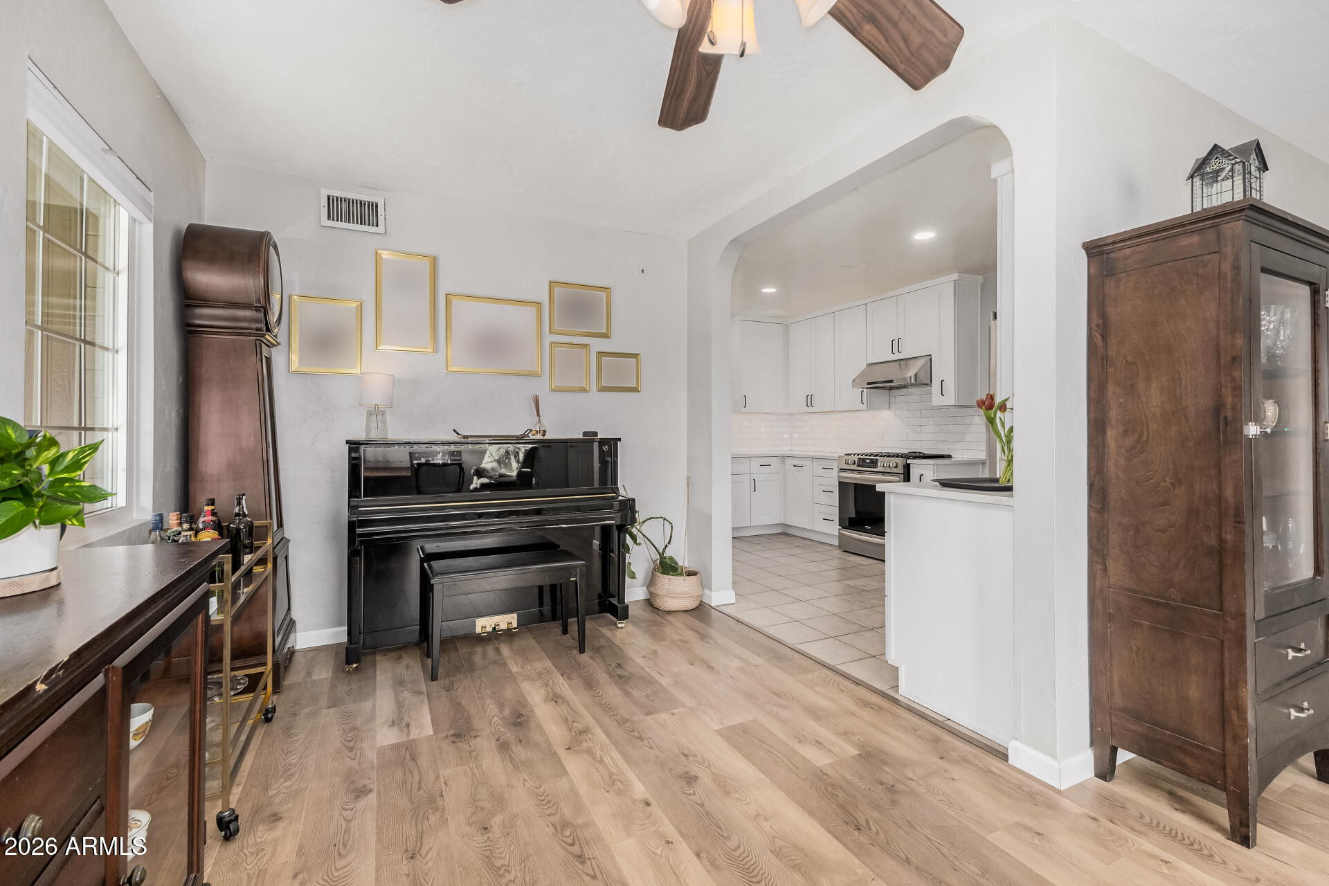 4232 North 10th Street Phoenix, AZ 85014 - Photo 6 of 21 a kitchen with stainless steel appliances a stove and a refrigerator