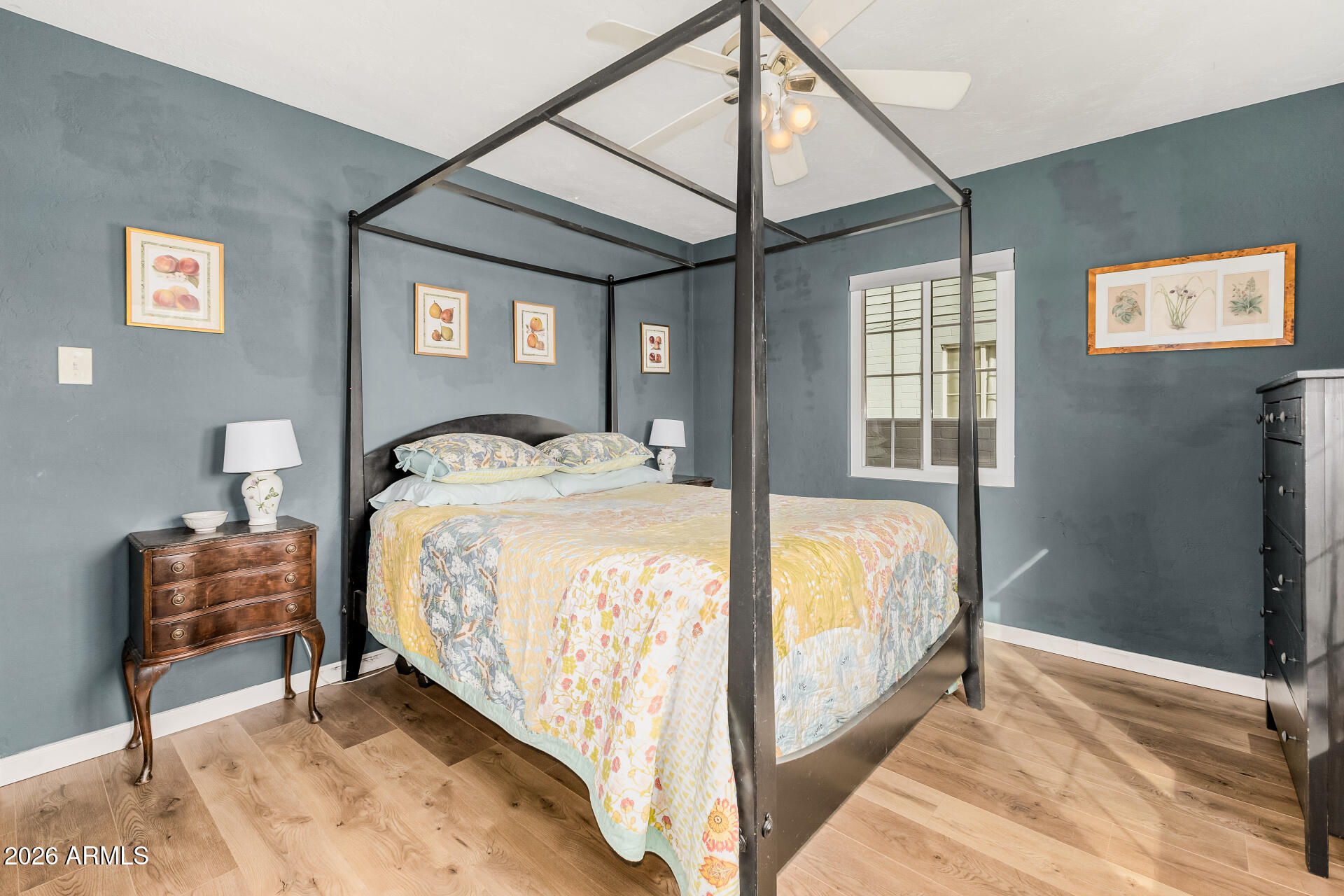 4232 North 10th Street Phoenix, AZ 85014 - Photo 9 of 21 a spacious bedroom with a bed and a dresser