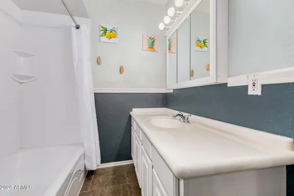 a bathroom with a sink and a bathtub