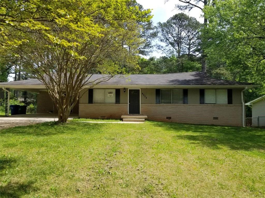 4334 Aldergate Drive Decatur, GA 30035 - Photo 1 of 1 a view of a house with a yard