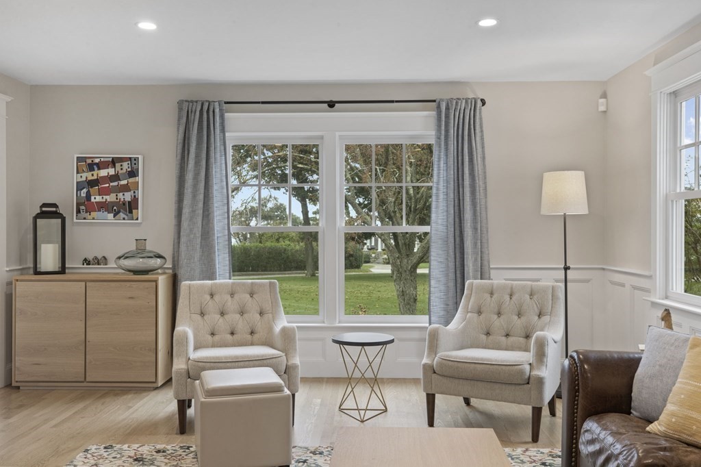111 Mann Hill Road Scituate, MA 02066 - Photo 20 of 37 a living room with furniture and a large window