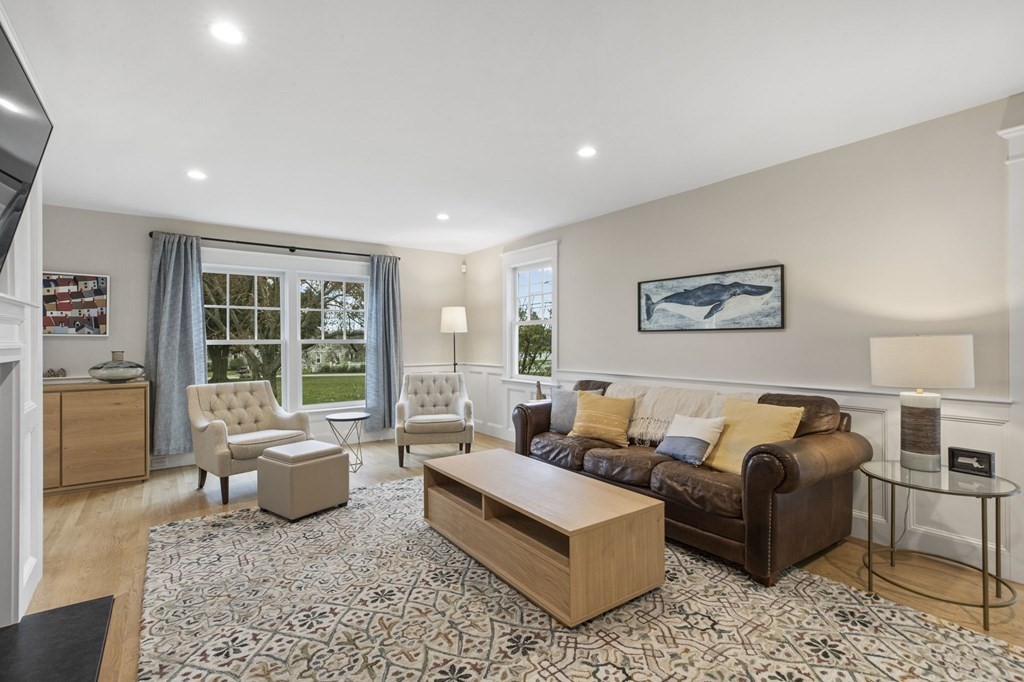 111 Mann Hill Road Scituate, MA 02066 - Photo 21 of 37 a living room with furniture and a couch