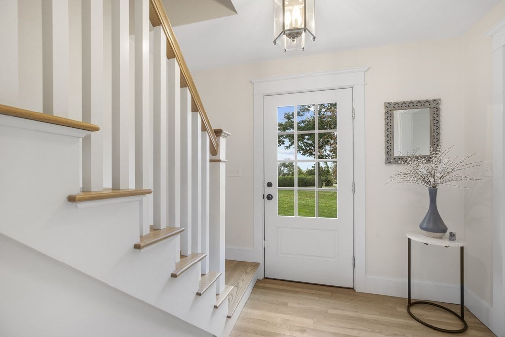 111 Mann Hill Road Scituate, MA 02066 - Photo 22 of 37 a view of an entryway with wooden floor