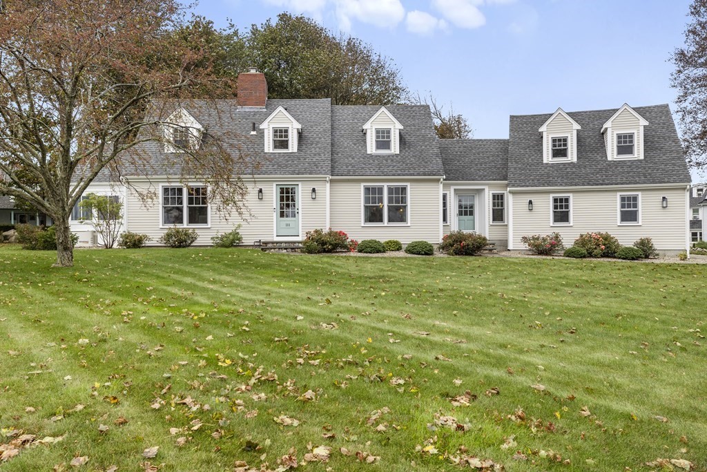 111 Mann Hill Road Scituate, MA 02066 - Photo 37 of 37 a front view of house with yard and green space