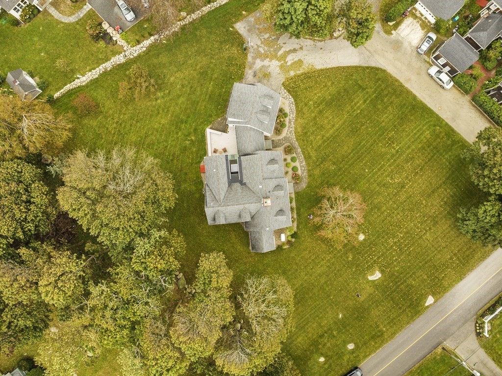 111 Mann Hill Road Scituate, MA 02066 - Photo 4 of 37 a building view with swimming pool in front of house