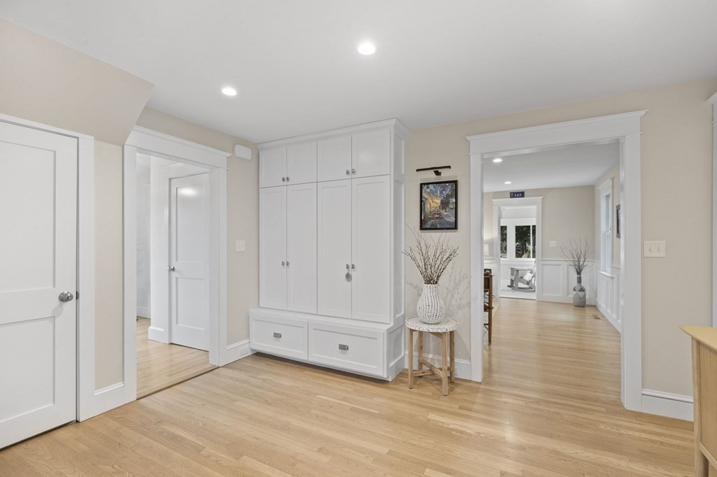111 Mann Hill Road Scituate, MA 02066 - Photo 7 of 37 a view of a room with wooden floor and white walls