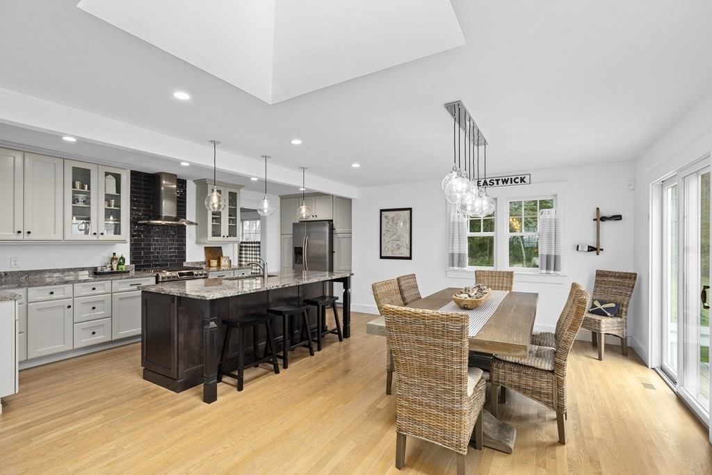 111 Mann Hill Road Scituate, MA 02066 - Photo 9 of 37 a view of a dining room with furniture window and wooden floor