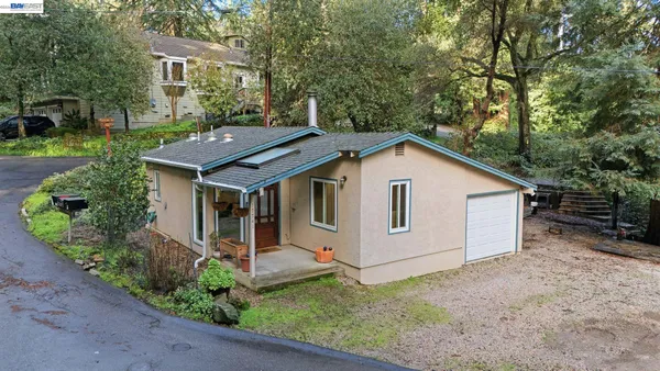 a house with yard in front of it