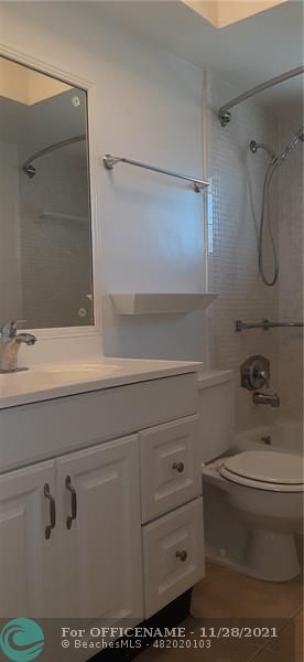 5800 Margate Boulevard Margate, FL 33063 - Photo 4 of 19 a bathroom with a toilet and a sink